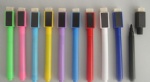 Whiteboard pen with brush and magnet