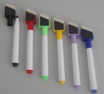 Whiteboard pen with brush and magnet